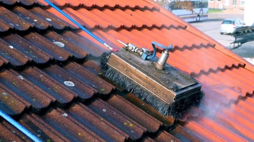 roof cleaning with brush